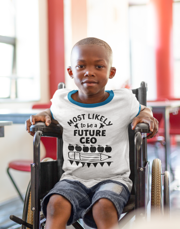 African American boy in wheelchair wearing a tshirt saying Most Likely to be a Future CEO
